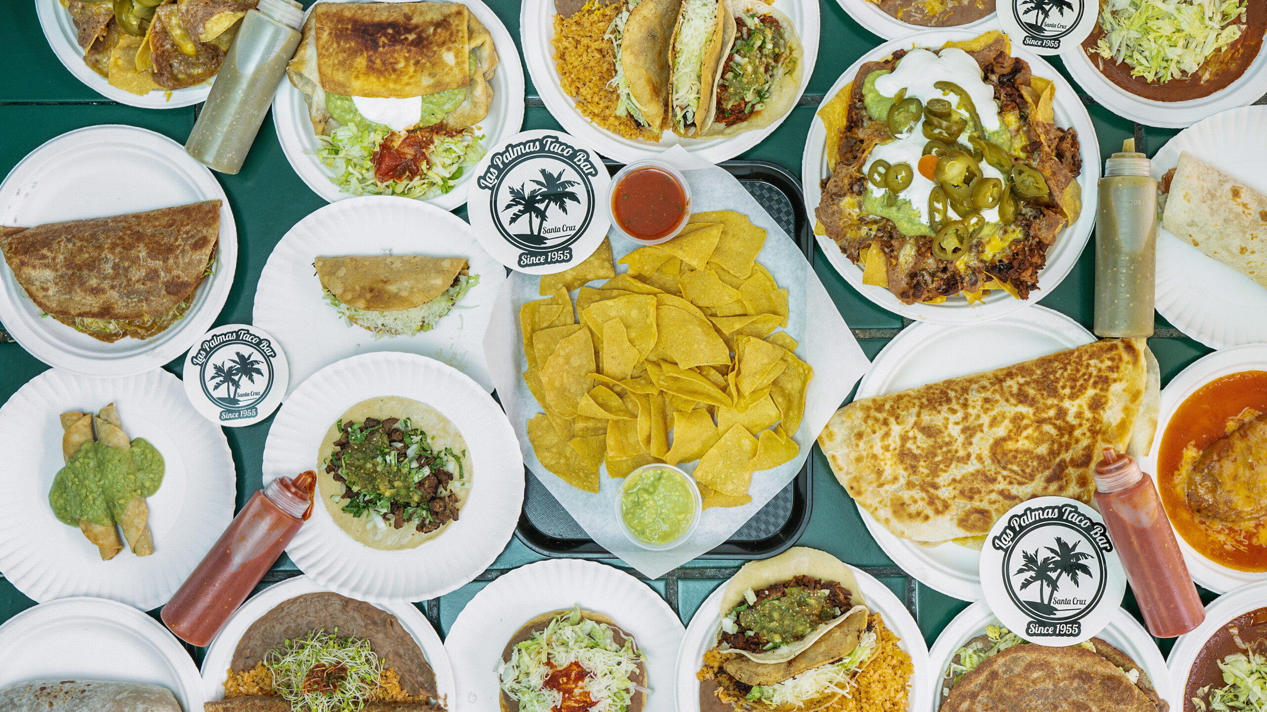 Assorted Mexican street food spread with tacos